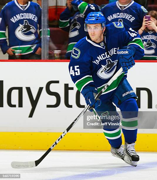 Jordan Schroeder of the Vancouver Canucks skates up ice during their NHL game against the Colorado Avalanche at Rogers Arena January 30, 2013 in...