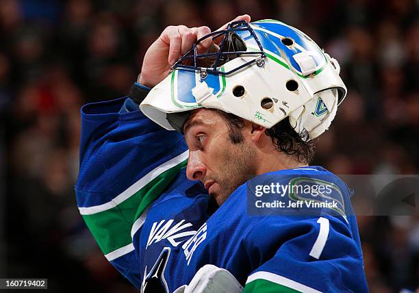 Roberto Luongo of the Vancouver Canucks looks on from his crease during their NHL game against the Colorado Avalanche at Rogers Arena January 30,...