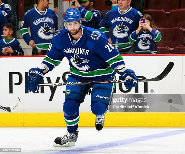 Chris Higgins of the Vancouver Canucks skates up ice during their NHL game against the Colorado Avalanche at Rogers Arena January 30, 2013 in...