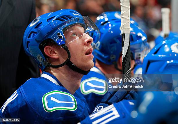 Jannik Hansen of the Vancouver Canucks looks on from the bench during their NHL game against the Colorado Avalanche at Rogers Arena January 30, 2013...