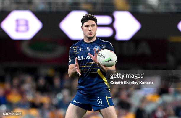 Mitchell Moses of the Eels catches the ball during the warm up before the round 24 NRL match between the Brisbane Broncos and Parramatta Eels at The...