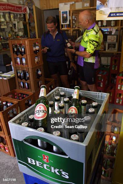 Bottles of Beck''s beer stand on display August 6, 2001 in a village store in southern Bavaria, Germany. The Belgian beer giant Interbrew announced...