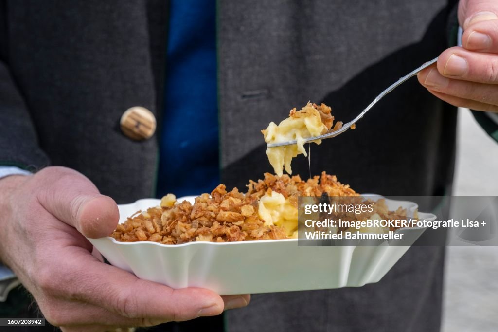 Allgaeuer Kaesspatzn, at the weekly market market on Hildegardplatz in front of St. Lorenz church, Kempten, Allgaeu, Bavaria, Germany