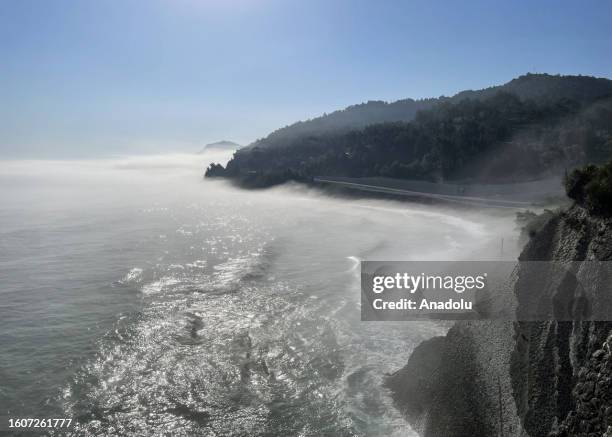 View of fog blankets over a sea during foggy weather in Abana district of Kastamonu, Turkiye on August 18, 2023. The fog called advection type, forms...