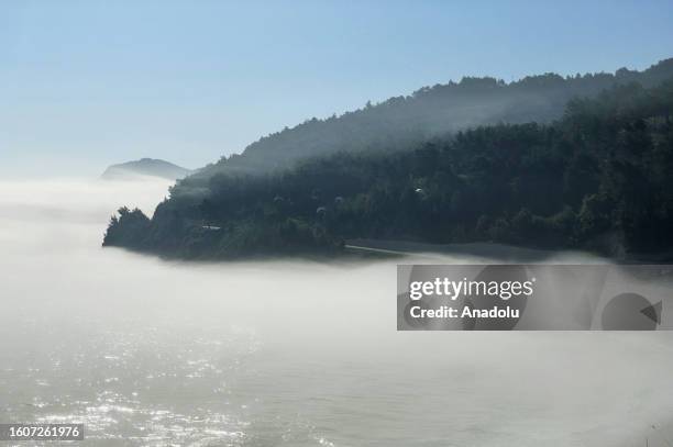 View of fog blankets over a sea during foggy weather in Abana district of Kastamonu, Turkiye on August 18, 2023. The fog called advection type, forms...