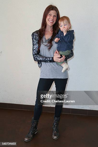 Recording artist Christa Black and son Moses Grae Lionheart attend anti-human trafficking family charity luncheon in support of Unlikely Heroes at...