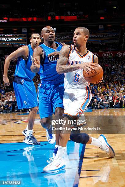 Eric Maynor of the Oklahoma City Thunder drives to the basket against Mike James of the Dallas Mavericks on February 04, 2013 at the Chesapeake...