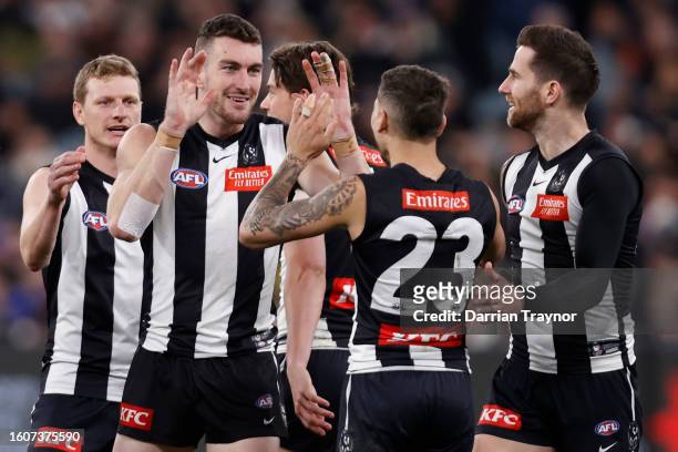 Daniel McStay of the Magpies celebrates a goal during the round 22 AFL match between Collingwood Magpies and Geelong Cats at Melbourne Cricket...