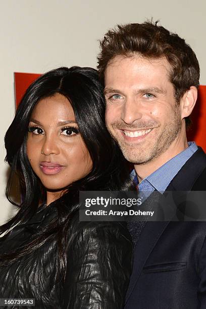 Toni Braxton and David Julian Hirsh arrive at the world premiere screening of "Twist Of Faith" at Stephen S. Wise Temple on February 4, 2013 in Los...