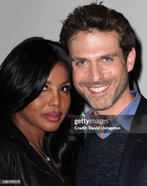 Actors Toni Braxton and David Julian Hirsh attend the premiere screening of "Twist of Faith" at the Stephen S. Wise Temple on February 4, 2013 in Los...