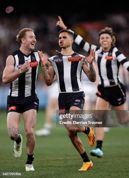 Bobby Hill of the Magpies celebrates a goal during the round 22 AFL match between Collingwood Magpies and Geelong Cats at Melbourne Cricket Ground,...