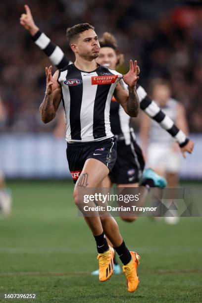 Bobby Hill of the Magpies celebrates a goal during the round 22 AFL match between Collingwood Magpies and Geelong Cats at Melbourne Cricket Ground,...