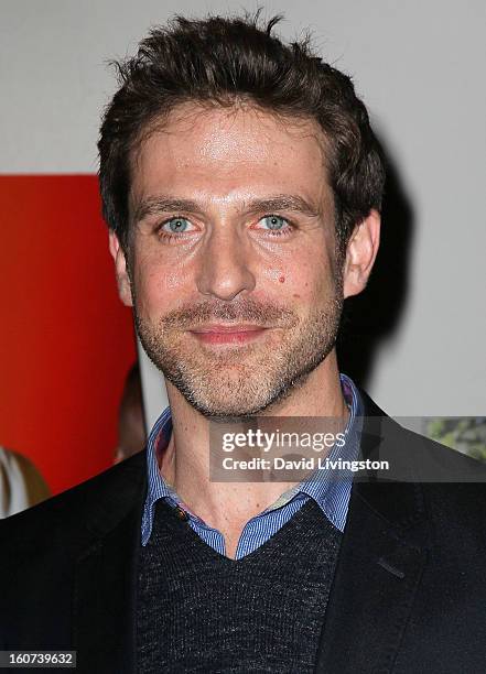 Actor David Julian Hirsh attends the premiere screening of "Twist of Faith" at the Stephen S. Wise Temple on February 4, 2013 in Los Angeles,...