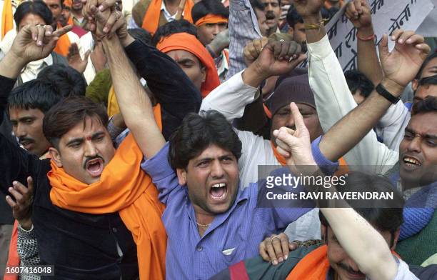 Hindu right wing Shiv Sena activits shout slogans during a march to the parliament in New Delhi, 06 December 2002. Hundred of activists staged a...