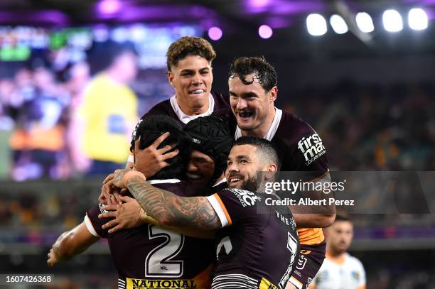 Brisbane Broncos celebrate a try during the round 24 NRL match between the Brisbane Broncos and Parramatta Eels at The Gabba on August 11, 2023 in...