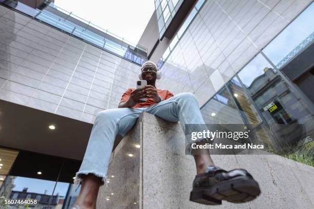 young people in urban environment - wide angle stock pictures, royalty-free photos & images