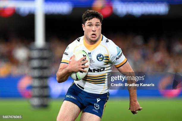 Mitchell Moses of the Eels runs with the ball during the round 24 NRL match between the Brisbane Broncos and Parramatta Eels at The Gabba on August...