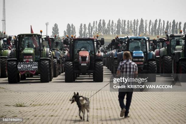 Farmers take their tractors to the streets for a protest against a new industrial plant of Ineos in Antwerp, on August 18, 2023. The collective...