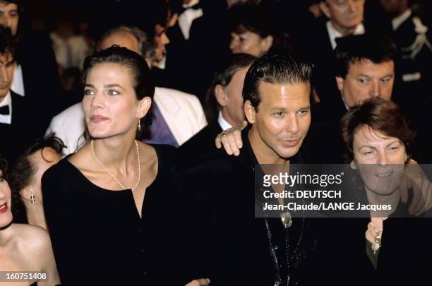 American actors Terry Farrell and Mickey Rourke with Italian director Liliana Cavani at the 42nd Cannes Film Festival 1989. Rourke starred in...