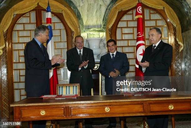 State Visit Of Jacques Chirac In Tunisia. Visite officielle de Jacques CHIRAC en Tunisie 3-4 décembre 2003 : le président CHIRAC au côté de son...