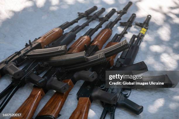 View of Kalashnikov rifle lies on the ground during in exercises on June 22, 2023 in Donetsk Oblast, Ukraine. With the help of airsoft, soldiers...