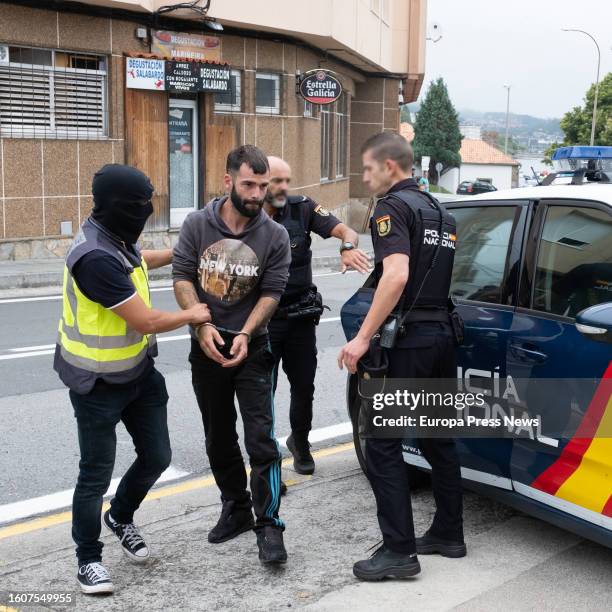 Police officers take the detainee to the Juzgado de Instruccion number 2 of Corcubion, on 11 August, 2023 in Corcubion, A Coruña, Galicia, Spain. The...