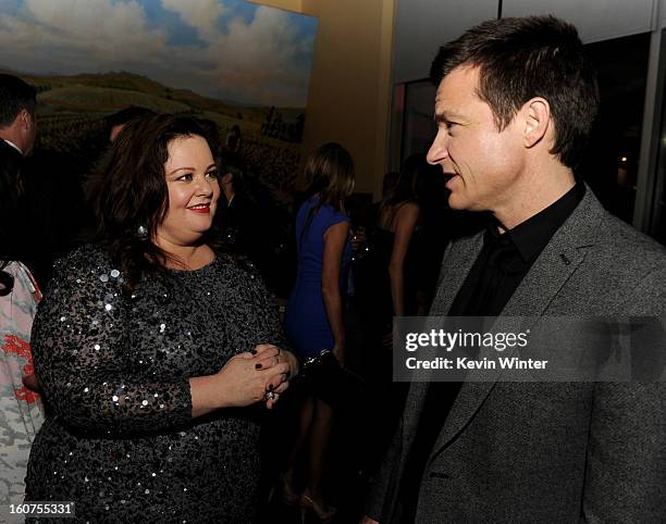 Actors Melissa McCarthy and Jason Bateman pose at the after party for the premiere of Universal Pictures' "Identity Thief" at Napa Valley Grille on...
