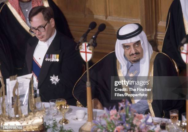 King Fahd bin Abdulaziz al Saud of Saudi Arabia with Prince Richard Duke of Gloucester during a dinner in the king's honour at the Guildhall in...