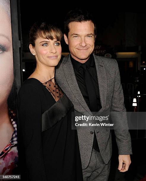 Actress Amanda Peet and actor Jason Bateman arrive at the premiere of Universal Pictures' "Identity Thief" at the Village Theatre on February 4, 2013...
