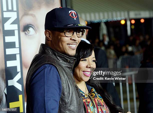 Actor/rapper T.I. And his wife Tiny arrive at the premiere of Universal Pictures' "Identity Thief" at the Village Theatre on February 4, 2013 in Los...