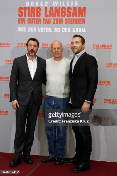Sebastian Koch, Bruce Willis and Jai Courtney attend a photocall for 'Die Hard - 'Ein Guter Tag Zum Sterben' at Hotel Adlon on February 5, 2013 in...