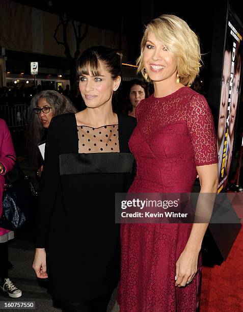 Actors Amanda Peet and Jenna Elfman arrive at the premiere of Universal Pictures' "Identity Thief" at the Village Theatre on February 4, 2013 in Los...