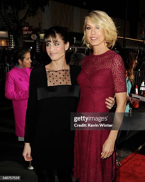 Actors Amanda Peet and Jenna Elfman arrive at the premiere of Universal Pictures' "Identity Thief" at the Village Theatre on February 4, 2013 in Los...