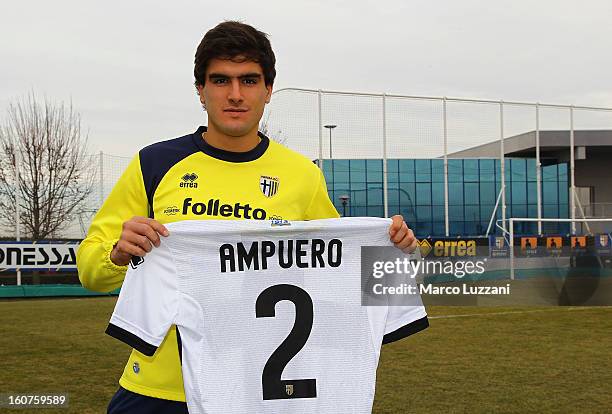 Alvaro Ampuero of Parma FC poses with the club shirt during new signings official portraits at the club's training ground on February 5, 2013 in...