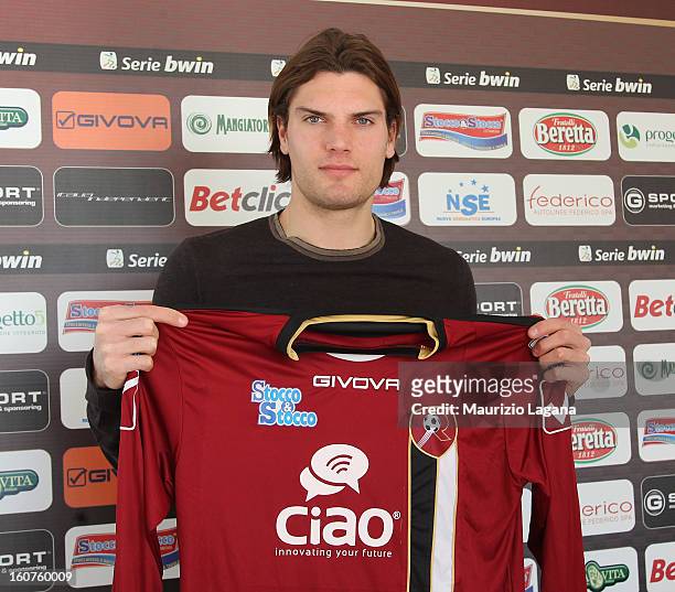 New player of Reggina, Federico Gerardi poses showing his new team shirt at Sports Center Sant'Agata on February 5, 2013 in Reggio Calabria, Italy.