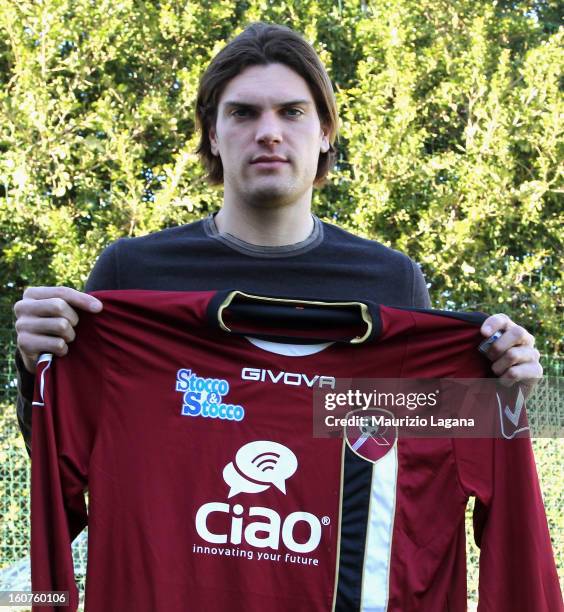 New player of Reggina, Federico Gerardi poses showing his new team shirt at Sports Center Sant'Agata on February 5, 2013 in Reggio Calabria, Italy.