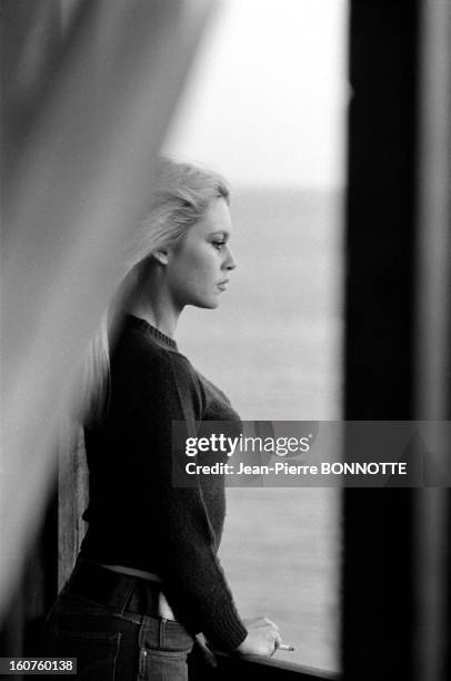 Brigitte Bardot smoking and looking at the sea on March 30, 1968 in Almeria, Spain.