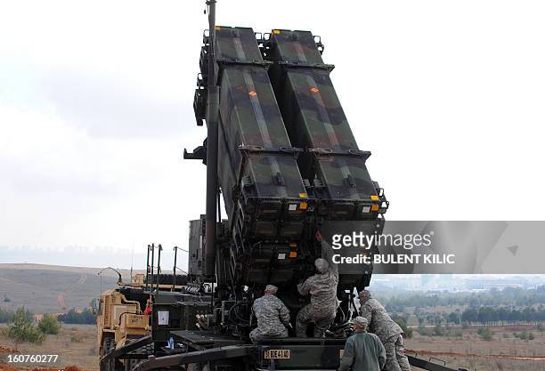 Soldiers work on a Patriot missile system at a Turkish military base in Gaziantep on February 5, 2013. The United States, Germany and the Netherlands...