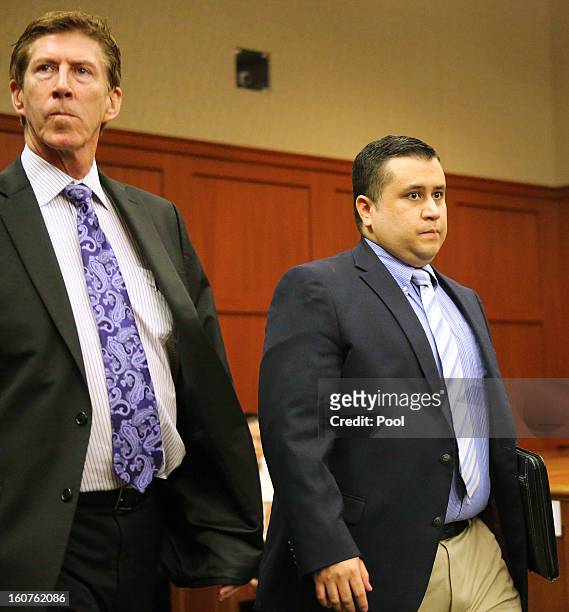 George Zimmerman arrives with his lead counsel, Mark O'Mara for a hearing in Seminole circuit court February 5, 2013 in Sanford, Florida. A judge...