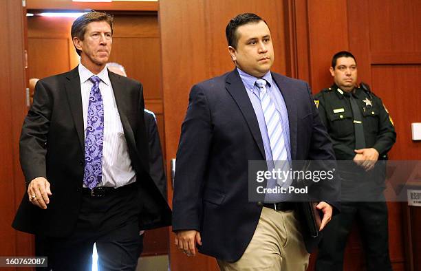 George Zimmerman arrives with his lead counsel, Mark O'Mara for a hearing in Seminole circuit court February 5, 2013 in Sanford, Florida. A judge...