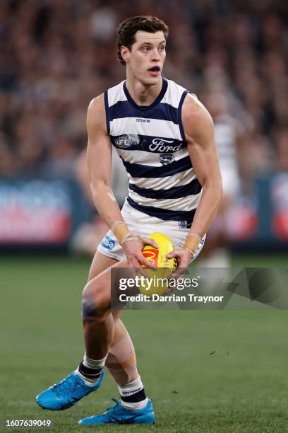 Shannon Neale of the Cats runs with the ball during the round 22 AFL match between Collingwood Magpies and Geelong Cats at Melbourne Cricket Ground,...