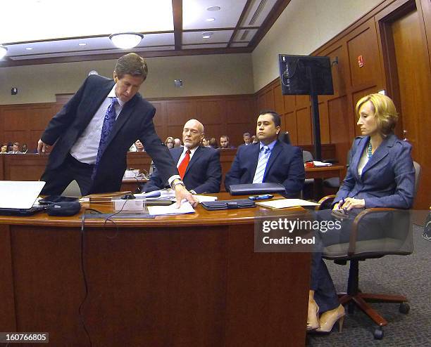 George Zimmerman appears with his attorneys in Seminole circuit court Mark O'Mara, Don West, and Lorna Truett on February 5, 2013 in Sanford,...