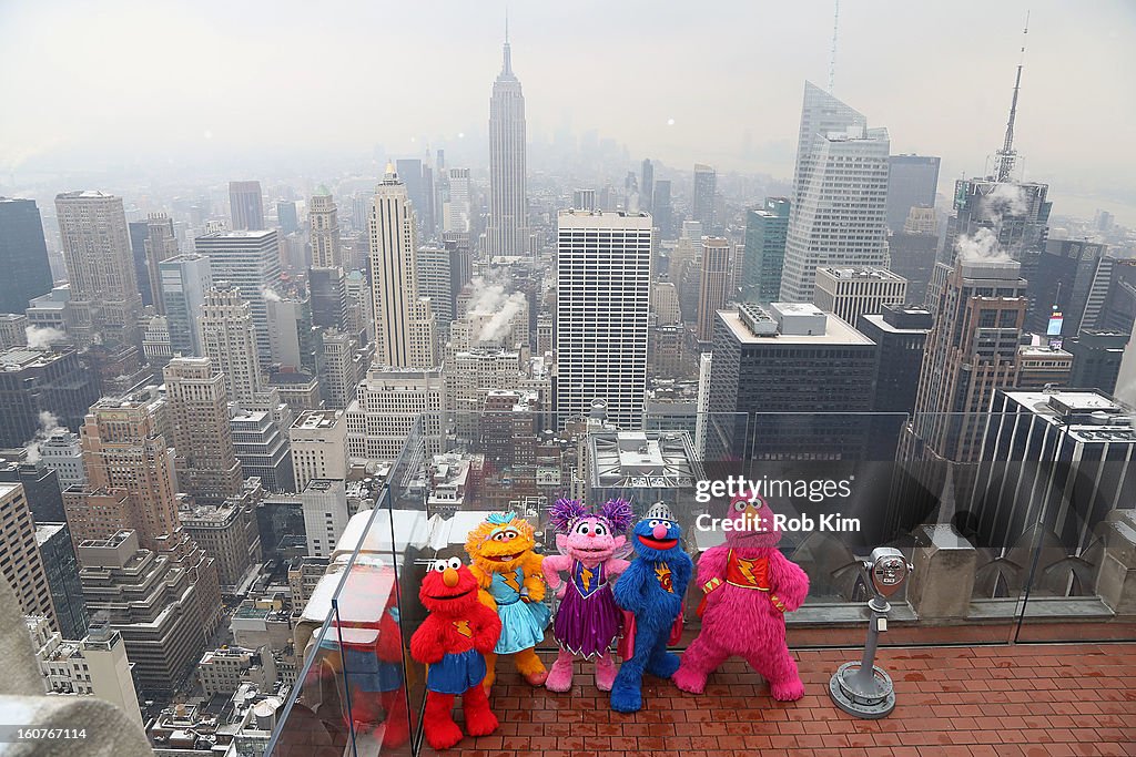 Elmo's Superheroes Visit Top Of Rock