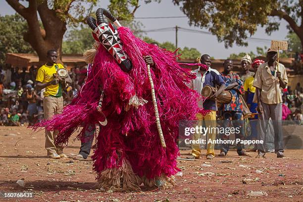 The festival of masks in Burkina Faso including masks leaves, fiber masks, feather masks, white masks, masks with straw, masks skins, dedougou,...