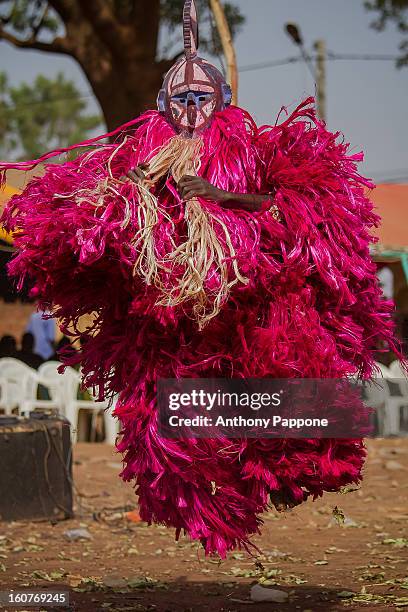 The festival of masks in Burkina Faso including masks leaves, fiber masks, feather masks, white masks, masks with straw, masks skins, dedougou,...