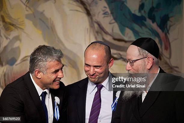 Israeli politician Yair Lapid , leader of the Yesh Atid party, speaks to Naftali Bennett, head of the Israeli hardline national religious party the...