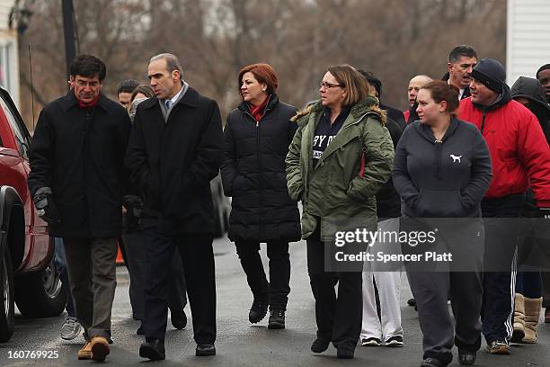 Staten Island residents and members of an Oakwood Beach homeowners association speak with City Council Speaker Christine Quinn in their heavily flood...