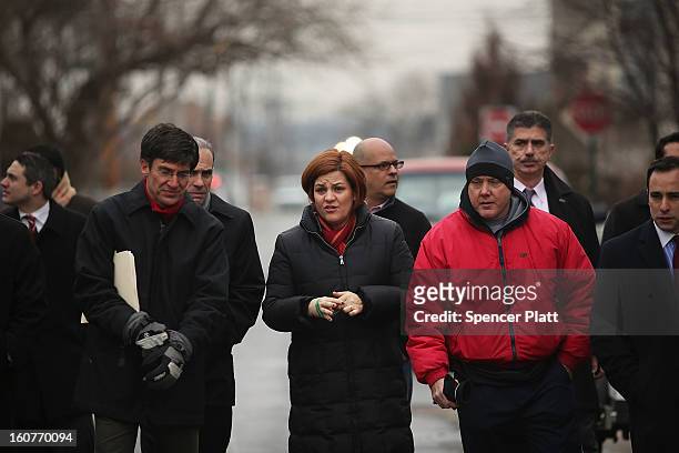 Staten Island residents and members of an Oakwood Beach homeowners association speak with City Council Speaker Christine Quinn in their heavily flood...
