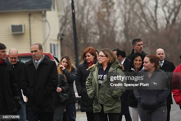 Staten Island residents and members of an Oakwood Beach homeowners association speak with City Council Speaker Christine Quinn in their heavily flood...