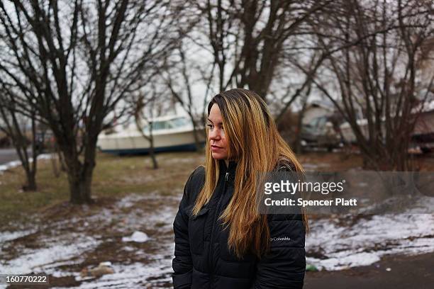 Oakwood Beach resident Samantha Langello, who lost her home, stands in the the heavily flood damaged Staten Island neighborhood on February 5, 2013...